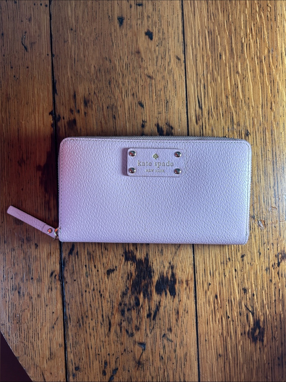 kate spade light pink zip-around large leather wallet